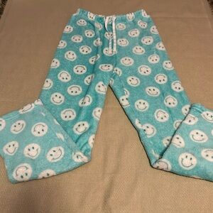 Teal smiley face pajama pants